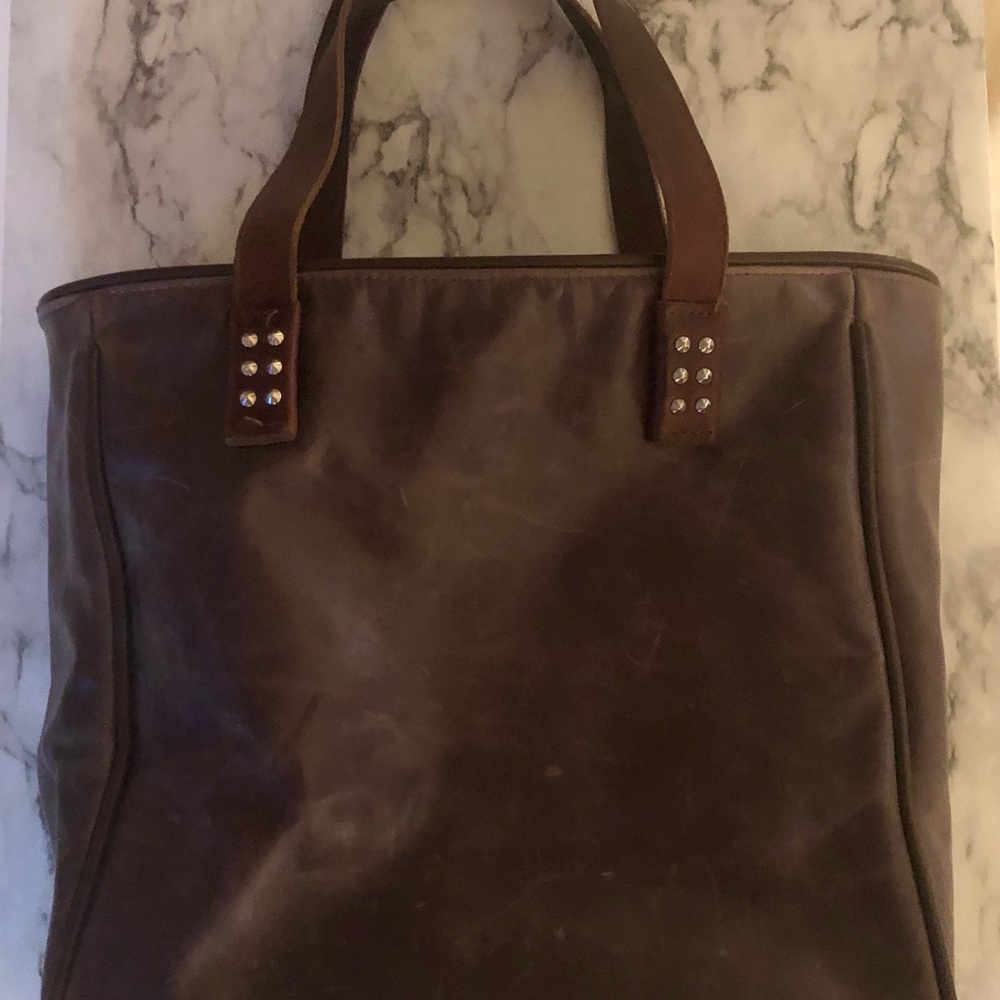 Brown leather Consuela tote with western print lining